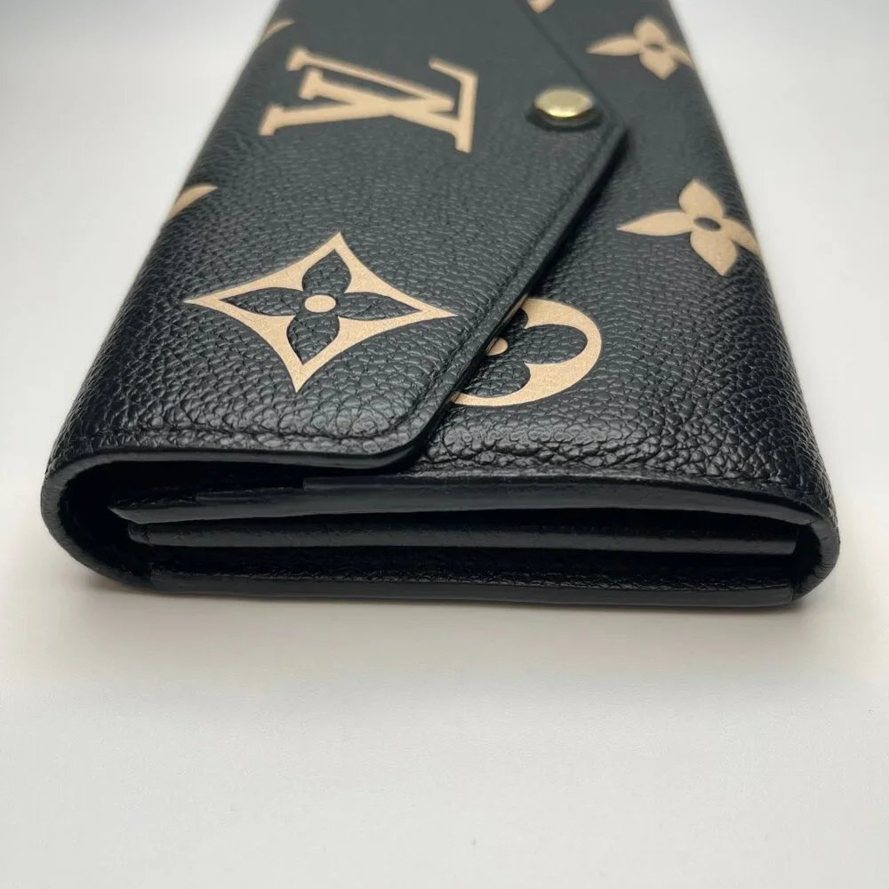 LOUIS VUITTON RFID Bicolor Monogram Empreinte Leather Sarah Wallet - Preowned - Picture 6 of 16
